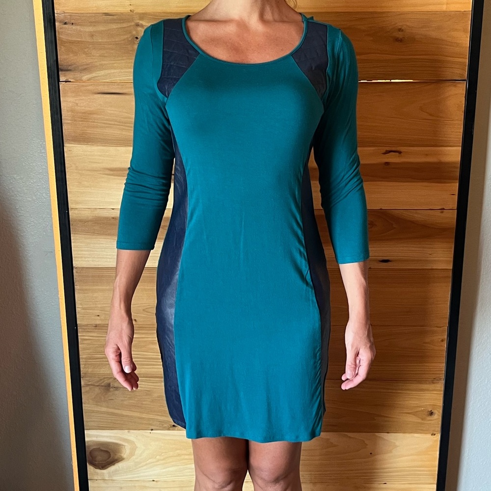 Teal dress with faux leather accents. 3-4 sleeve